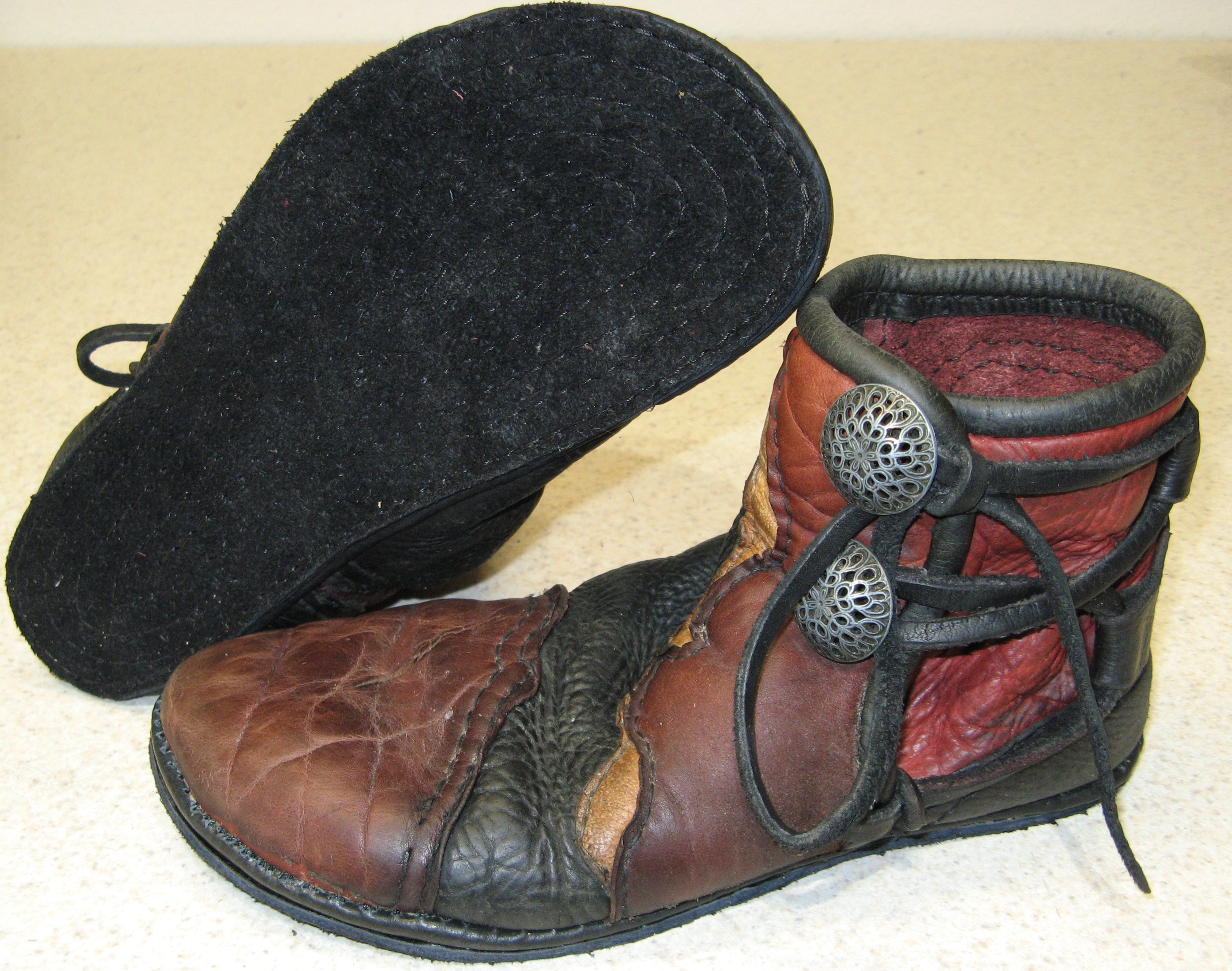 repaired leather moccasins soles
